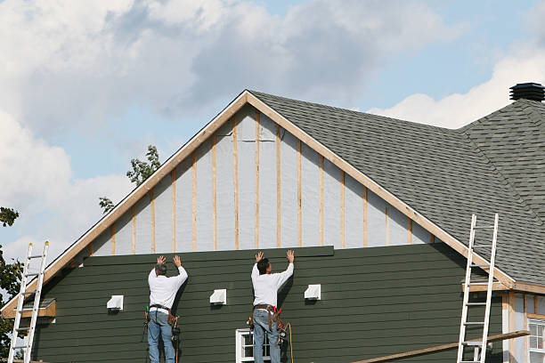 Professional Siding technician working in Fayetteville, NY